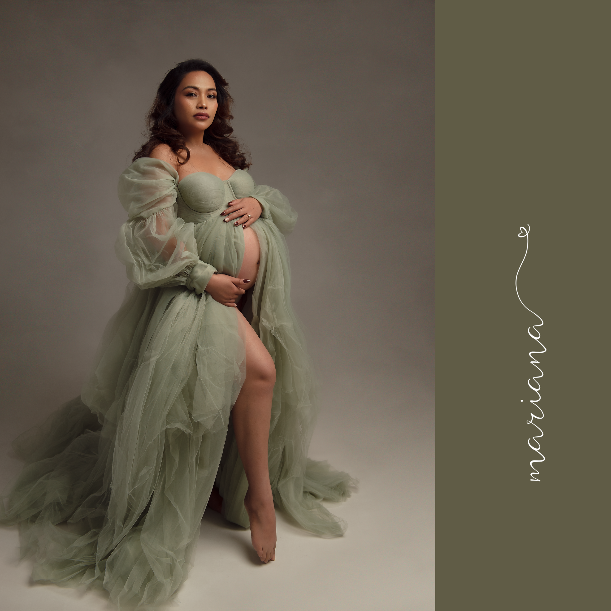 Maternity portrait in a sage gown